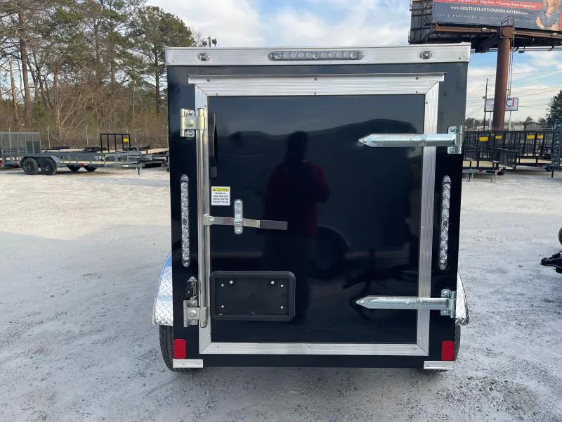 Rear barn door open on a 4x8 enclosed trailer