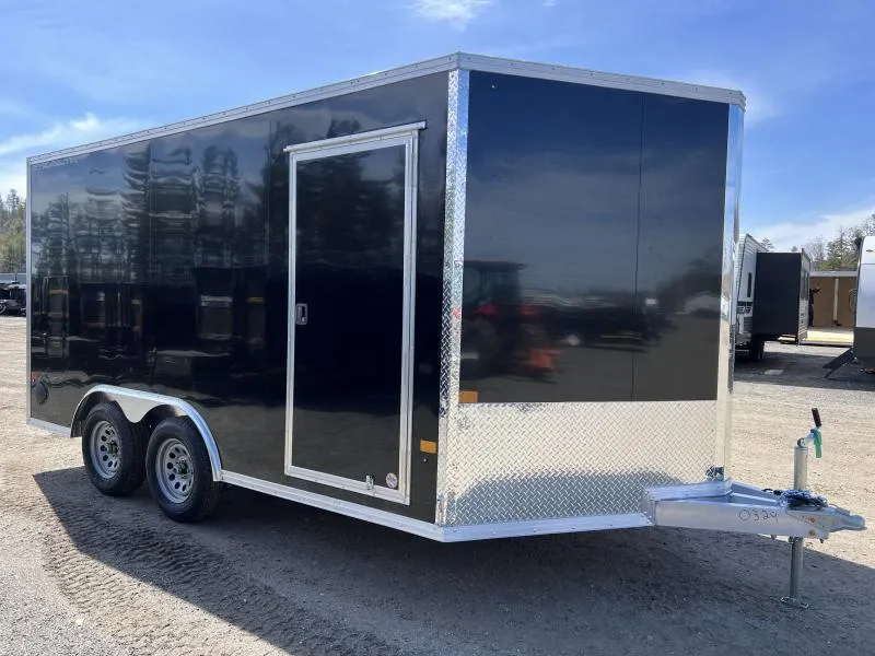 8.5x14 enclosed trailer loaded with landscaping equipment