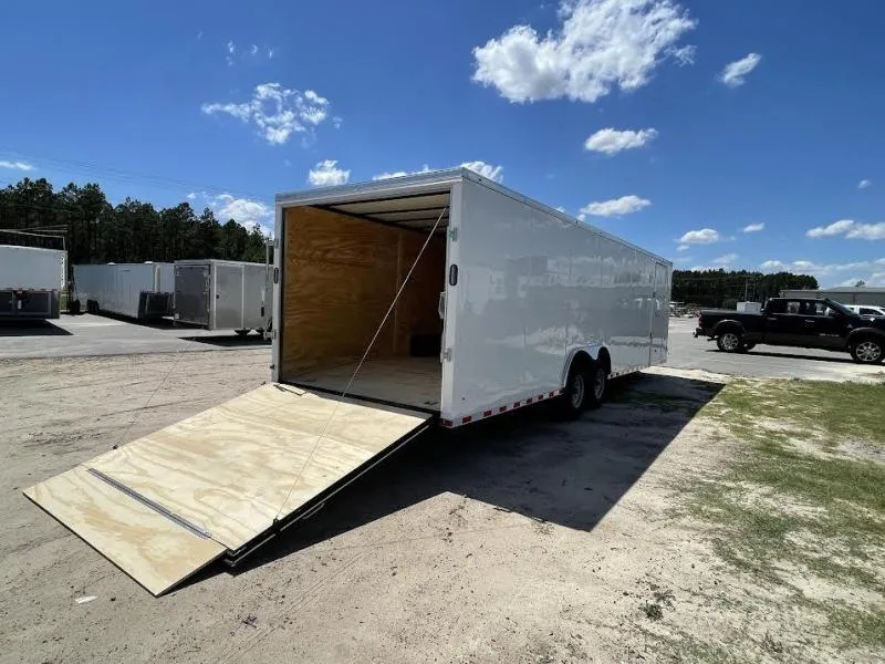 8.5x28 enclosed car hauler trailer with ramp door lowered for vehicle loading