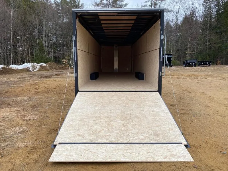 Interior of an 8.5x28 enclosed trailer with plywood flooring and finished walls