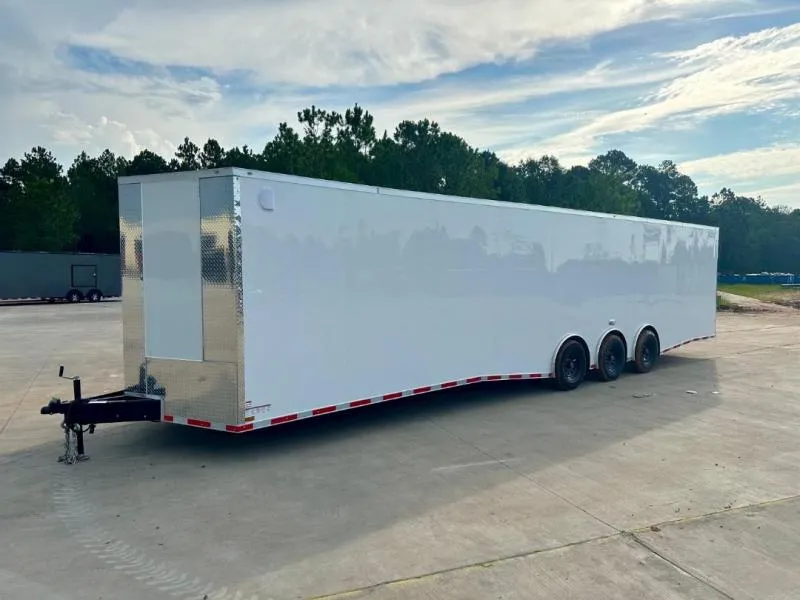Rear barn doors on enclosed trailer with ladder racks