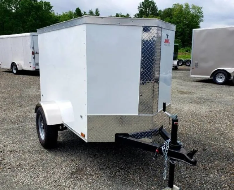 Front view of a small enclosed cargo trailer with V-nose design