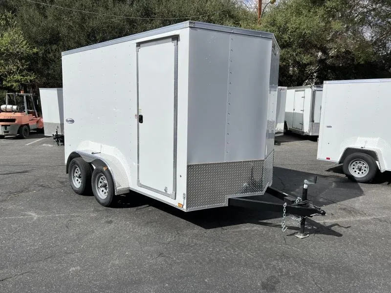 Comparison graphic showing torsion axle vs leaf spring trailer suspension systems